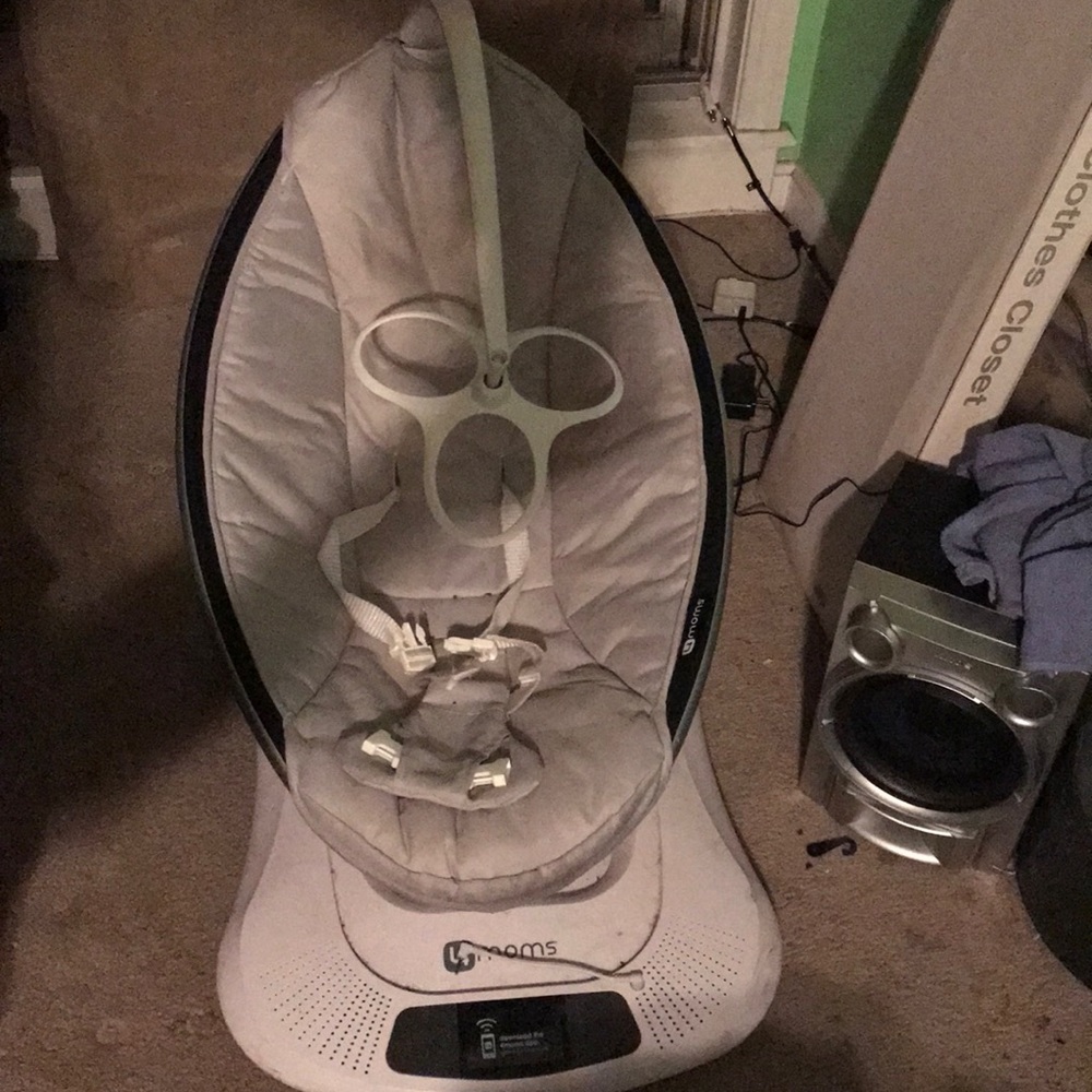 Baby toys as well as bassinet and a swing